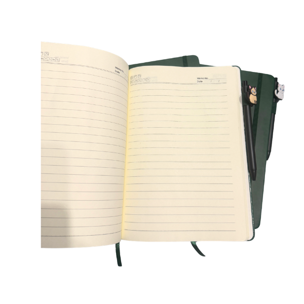 green lined journal with elastic band and cat pen set on white background
